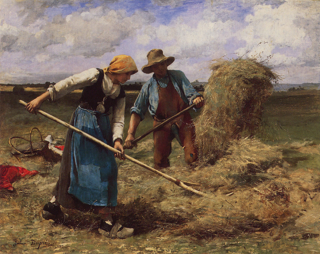 man and woman working in the field